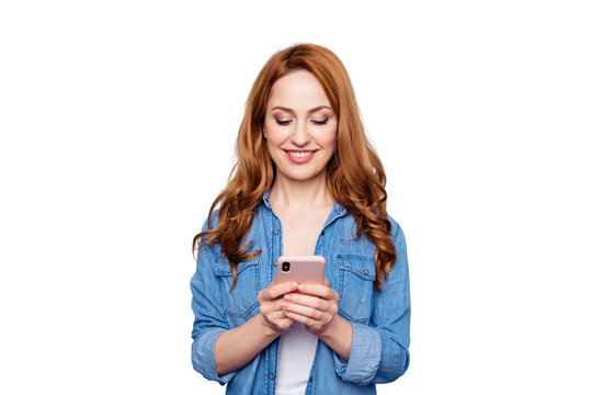 Close up photo beautiful she her lady arm hand telephone smart phone reader look see news check instagram followers stories pictures wear casual blue jeans denim shirt isolated grey background