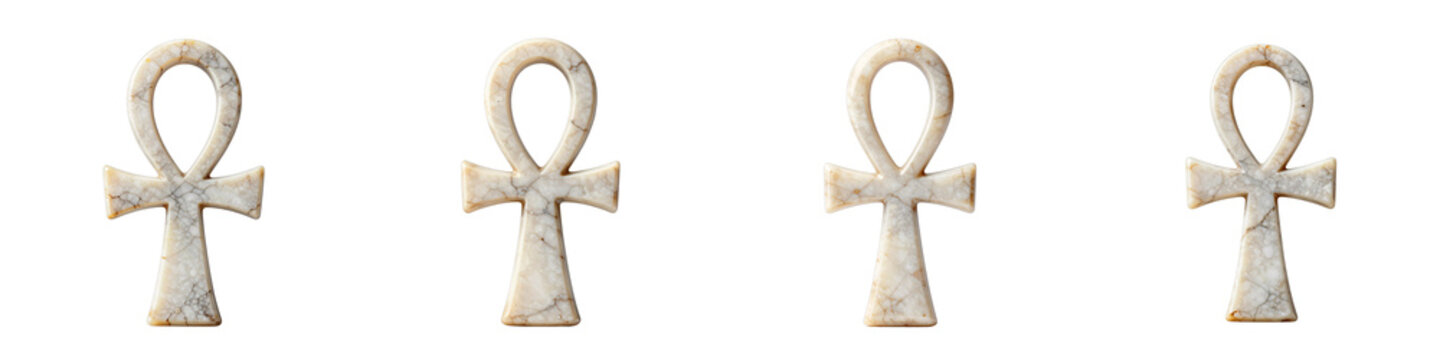 Four ancient egyptian ankh cross symbols isolated on black backdrop in a panoramic shot