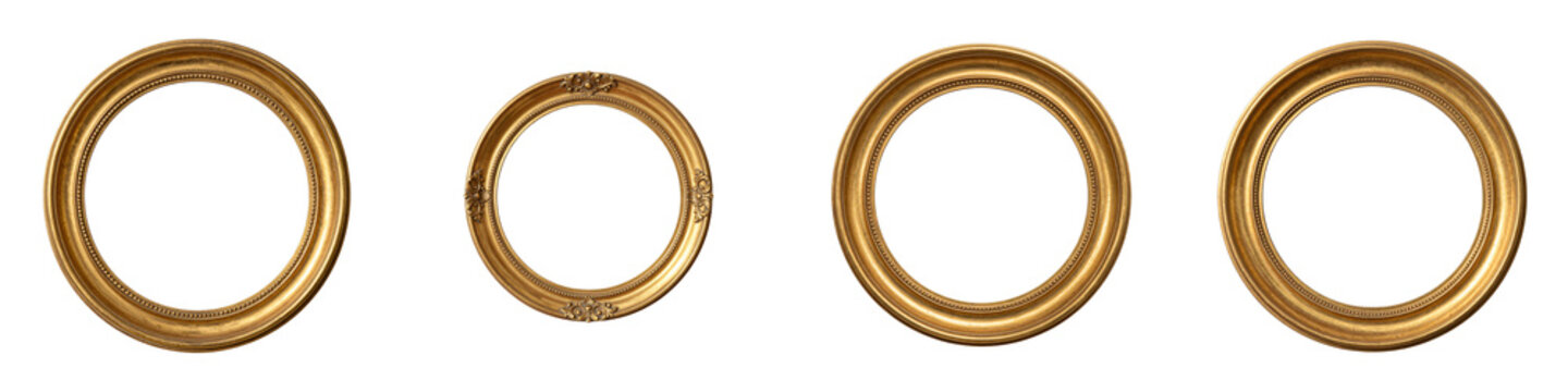 Four empty oval gold frames sitting in a row against a black background