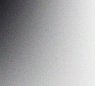 Abstract monochrome background with a smooth gradient transition from dark charcoal grey to bright white light