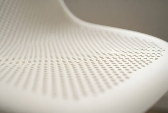 Texture pattern on the backrest of a molded plastic chair