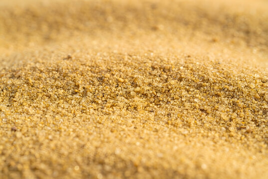 &bull;	Fine golden sand texture layer background for design