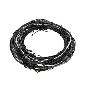 Coiled bundle of black metal wire tied in several places, isolated on a transparent background for industrial, construction, repair, and recycling concepts.