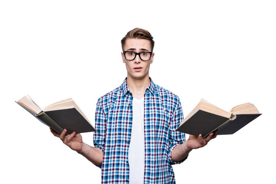 I just can not figure it out! Portrait of smart teen, teenager man in blue checkered shirt and white t-shirt hold books in hands, stand isolated on light gray background with confused face