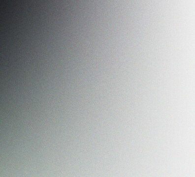 Abstract monochrome background with a smooth gradient transition from dark charcoal grey to bright white light