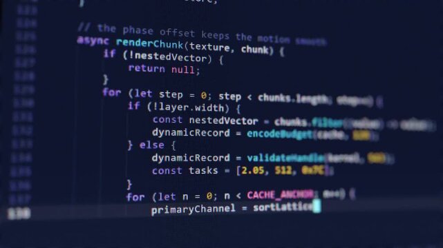 Close up macro shot of a computer screen with typing highlighted JavaScript source code. Blinking cursor on a dark blue software development interface with visible pixels and shallow depth of field