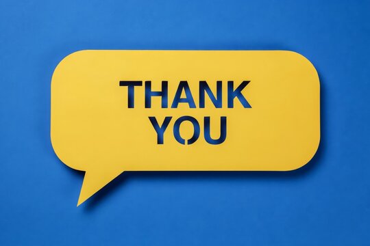 Yellow speech bubble with the words thank you cut out, placed on a vibrant blue background, conceptual design for communication and gratitude
