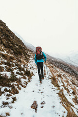 Obraz premium Mountaineer climbing Forcan Ridge in Glen Shiel, Scotland