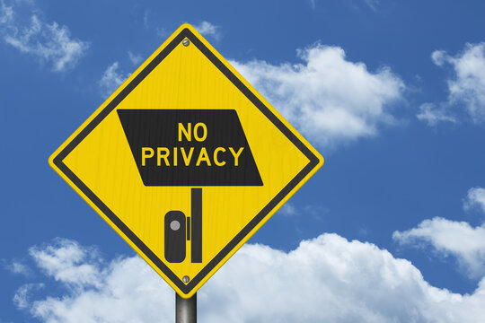 Surveillance camera icon with No Privacy text yellow warning sign with sky for license plate reader LPR