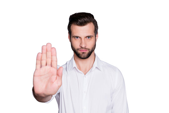 Portrait of strict manager executive man hold hand stop avoid corona virus world contamination wear white shirt isolated over gray color background