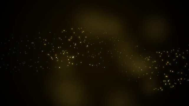 Golden sparkles floating in dark space, glowing particles creating magical bokeh effect