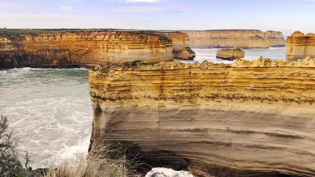 Layered limestone gorges and sheer coastal cliffs at Loch Ard Gorge, Port Campbell National Park, Great Ocean Road, Victoria, Australia