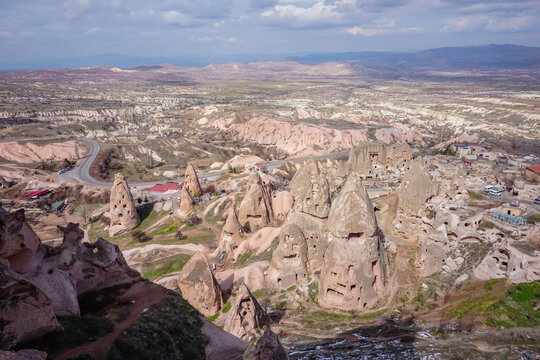 Panoramic view of fairy chimneys and rock-cut cave dwellings in Cappadocia