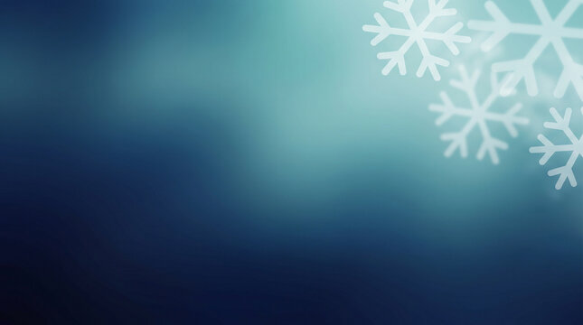 White snowflakes on a soft blue blurry winter background