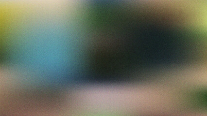 Abstract blurry gradient background featuring soft color transitions from green and blue to warm beige tones with subtle noise texture