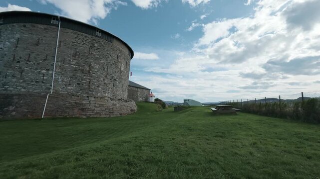 Stone tower and flagpole of Munkholmen fortress island near Trondheim