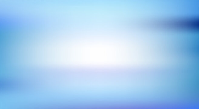 Abstract soft blue gradient background with bright light in center
