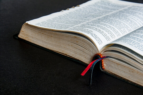 Opened Holy Bible representing faith and prayer.