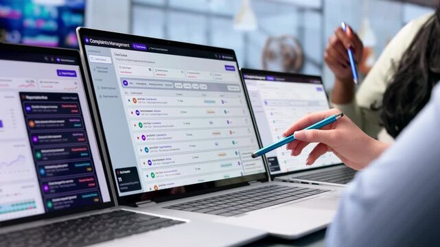 Customer Service Manager Reviews Complaint Case With Software