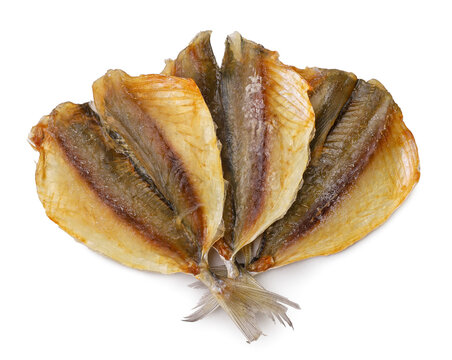 Three dried fish on a white background. Top view