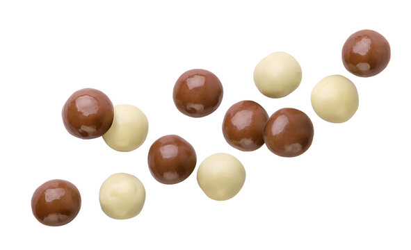 Chocolate balls flying on a white background. Isolated
