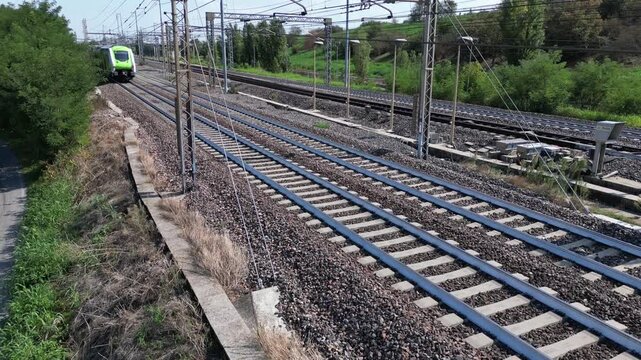 Europe, Italy , Milan - Frecciarossa Hight speed 300km h train railway from Milan  to Rome view from the drone - the faster way to travel in Italy for tourist and passengers - tourist destination 