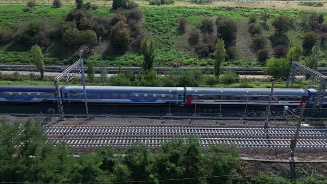 Europe, Italy , Milan - Frecciarossa Hight speed 300km h train railway from Milan  to Rome view from the drone - the faster way to travel in Italy for tourist and passengers - tourist destination 