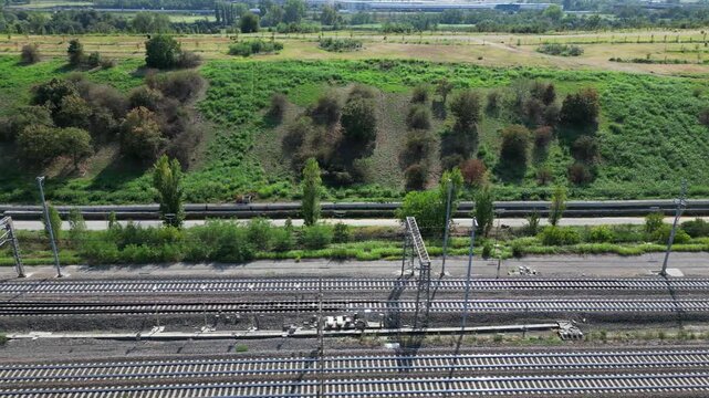 Europe, Italy , Milan - Frecciarossa Hight speed 300km h train railway from Milan  to Rome view from the drone - the faster way to travel in Italy for tourist and passengers - tourist destination 