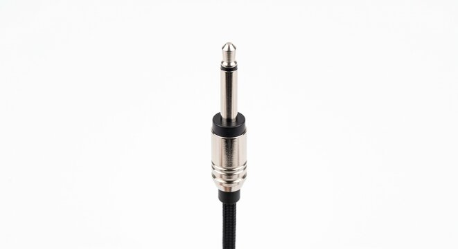 3.5mm Eurorack modular patch cable tip, nickel-plated brass audio jack with insulation rings. Analog synthesis hardware component isolated on white background.