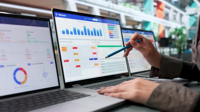 Sales Manager Tracking Customer Leads Using CRM Software