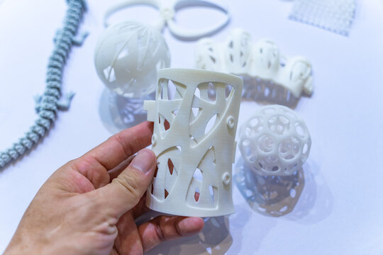 hand with orthopedic plastic prosthesis printed on powder 3D printer for hand.New modern progressive additive technology