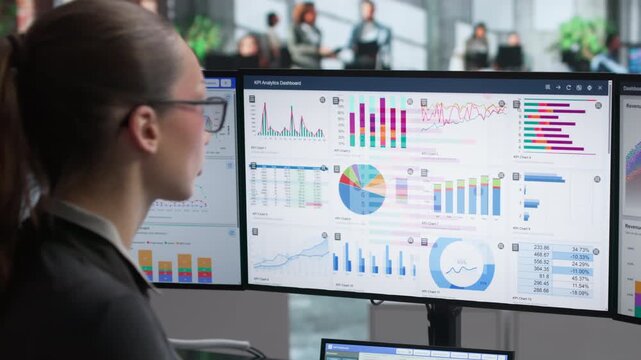 Financial Analyst Reviewing Dashboard Metrics