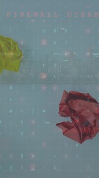 Video displays color-changing crumbled paper in data processing.