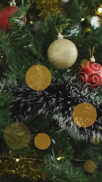 Animated Christmas tree clip showcases holiday tradition with yellow spots.