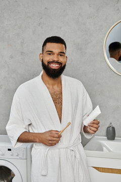 Handsome young man enjoying a cheerful moment of self care in his lovely home