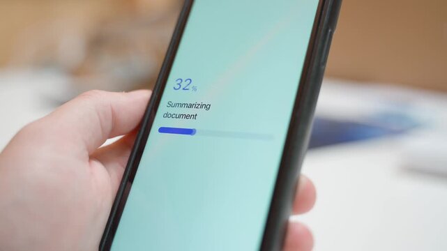 Document summarizing progress on smartphone screen completes with summary ready