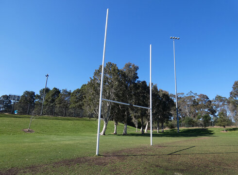 Typical country town rugby field or pictch paddock in a summer day empty