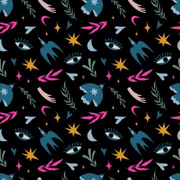 Mystical boho seamless pattern with blue birds, evil eye, stars, and abstract botanical leaves on dark background
