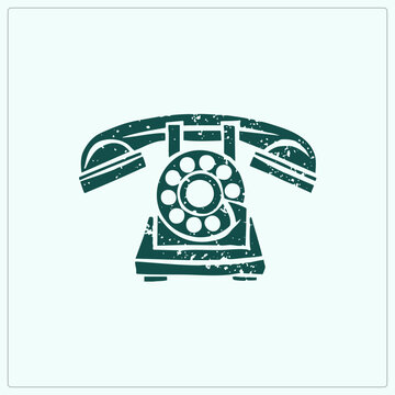 Vintage grunge glyph of a rotary dial phone, the classic ring dialer and candlestick era, rendered as a distressed teal stamp style cutout with textured speckle wear.