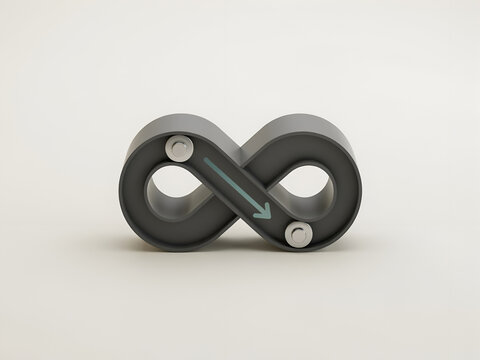 Gray infinity symbol with rolling ball and arrow during studio lighting for concept of continuous progress
