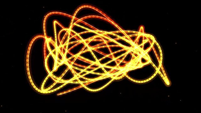 Abstract glowing golden light trails on black background