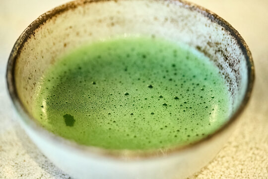 Matcha green tea bowl with ceremonial foam