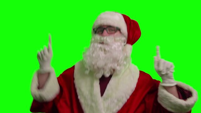 Santa with green screen background dancing and celebrating during holiday season