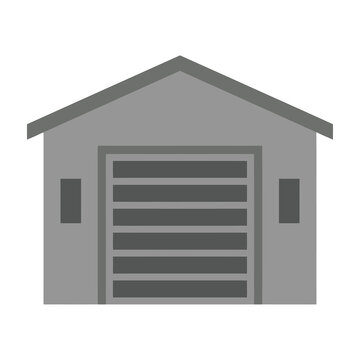 Grey garage with closed door and roof