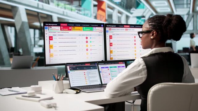 Risk Manager Carefully Assessing Enterprise Threats While Working