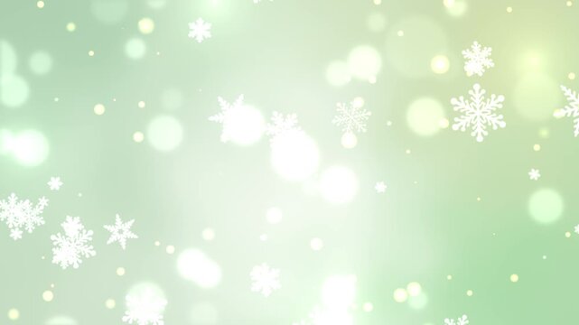 大きな雪の結晶と光の粒子が降るグリーンのシームレスループ動画素材