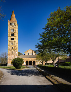 Pomposa Abbey campanile reaching blue sky in Emilia-Romagna, Italy
