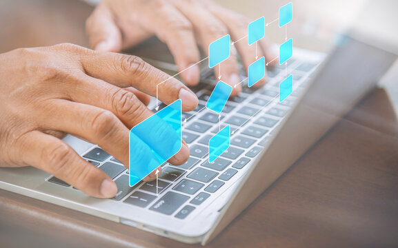 Business Process Automation Concept with Digital Flowchart Overlay and Laptop Typing.