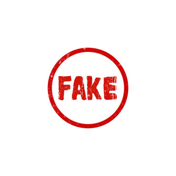 Red round rubber stamp with the word fake written in bold capital letters for a grunge verification mark