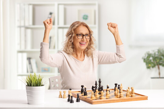 Woman winning a chess game